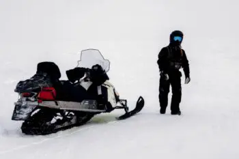 U.S. and Norwegian special operations forces conduct land-based arctic mobility training on snow mobiles in Alaska